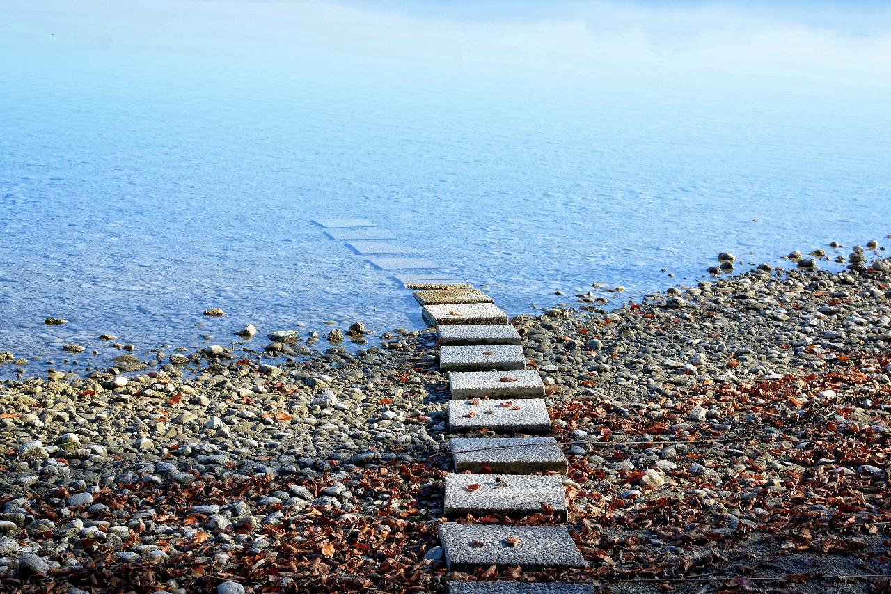 Step stones leading into the water. Connecting the dots.