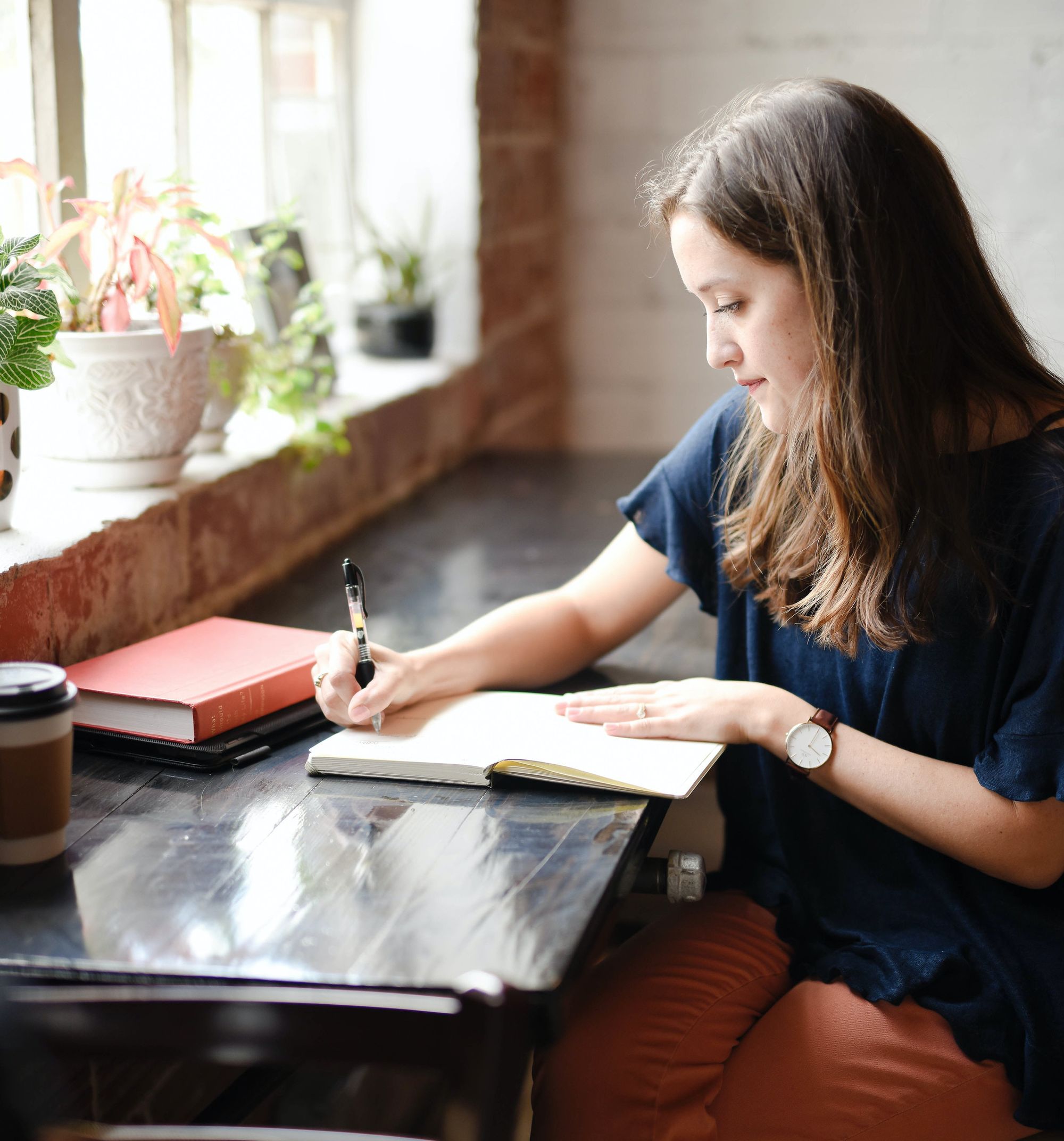 Woman studying. A high quality herbal education really pays off.