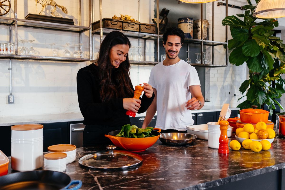 Couple cooking in the kitchen.